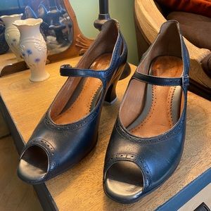 Navy blue peep-toe Mary Jane’s